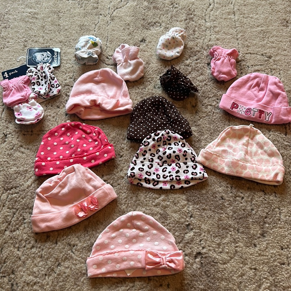 Set of baby girl newborn hats and mittens